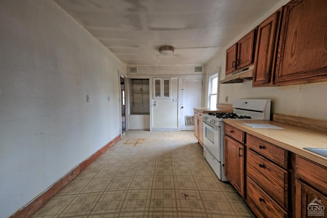 kitchen featuring white gas stove