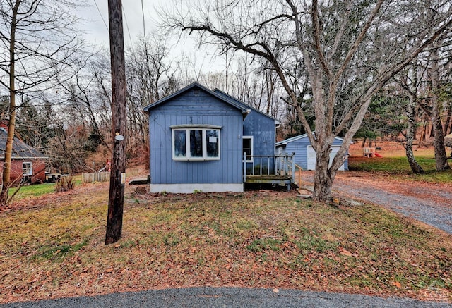 view of front of property featuring a wooden deck