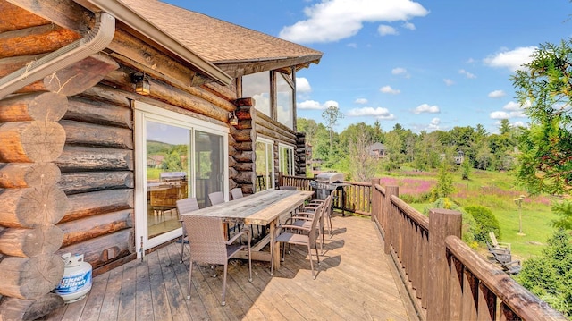 wooden deck featuring grilling area