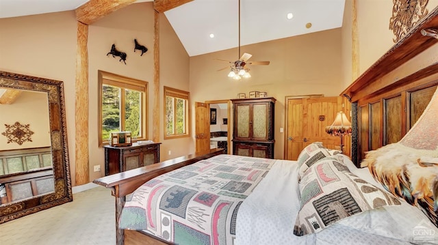 carpeted bedroom with ceiling fan, beam ceiling, and high vaulted ceiling