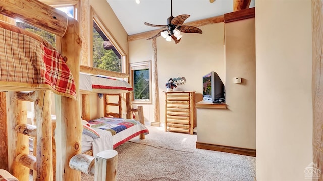 bedroom with carpet, ceiling fan, and high vaulted ceiling