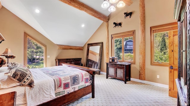 carpeted bedroom with beam ceiling and high vaulted ceiling