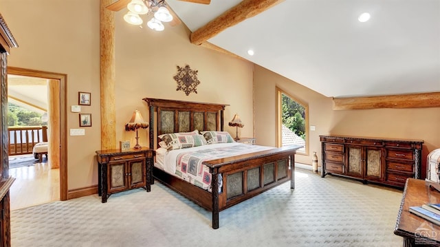 bedroom featuring ceiling fan, access to exterior, light carpet, and multiple windows