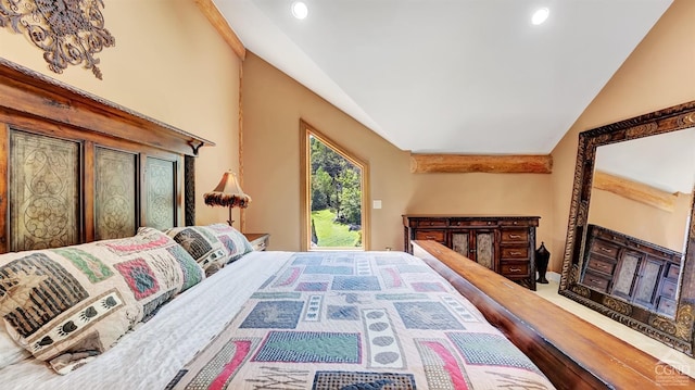 bedroom featuring beam ceiling and high vaulted ceiling