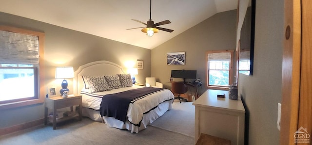 bedroom featuring vaulted ceiling, carpet flooring, and ceiling fan