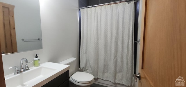 full bathroom featuring vanity, toilet, and shower / bathtub combination with curtain