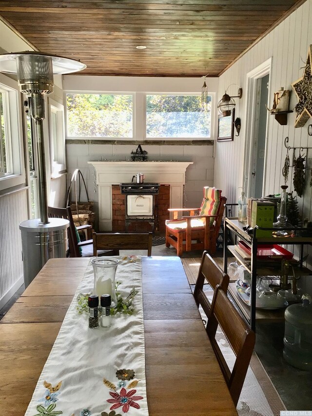 sunroom / solarium with wood ceiling and plenty of natural light