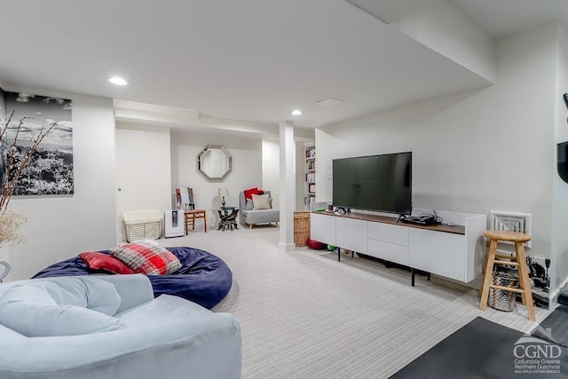 living room featuring light colored carpet