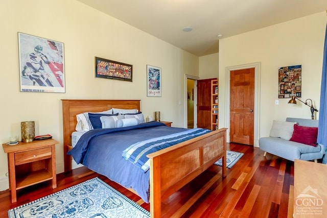 bedroom with hardwood / wood-style floors