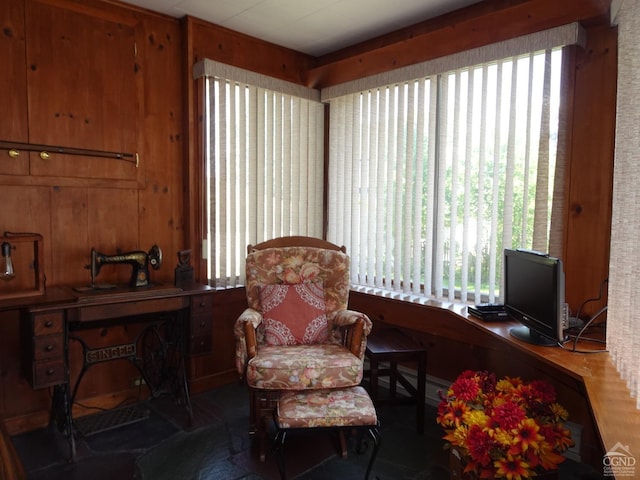 office area featuring wooden walls