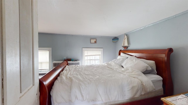 bedroom with radiator heating unit