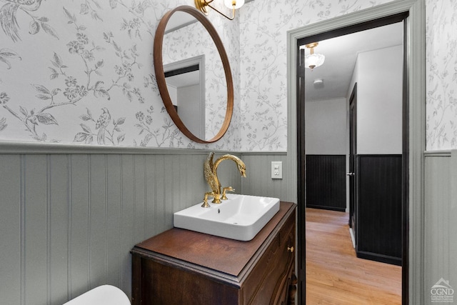 bathroom featuring vanity and hardwood / wood-style flooring