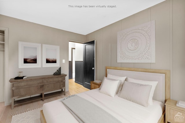 bedroom featuring light wood-type flooring