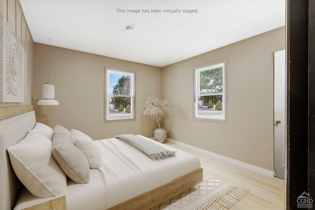 bedroom featuring light hardwood / wood-style flooring