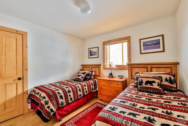 bedroom featuring hardwood / wood-style floors