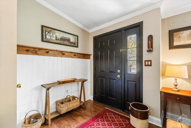 entryway featuring dark wood-style floors, baseboards, and ornamental molding