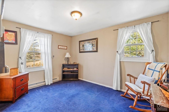 sitting room featuring a wealth of natural light, carpet flooring, a baseboard heating unit, and baseboards