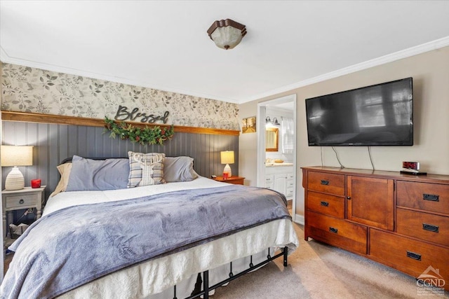 bedroom featuring light carpet, ensuite bathroom, crown molding, and wallpapered walls