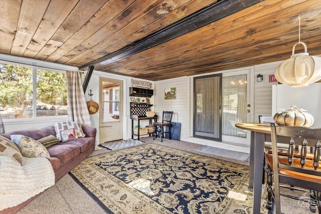 living area featuring wood ceiling