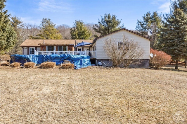 rear view of house with a deck