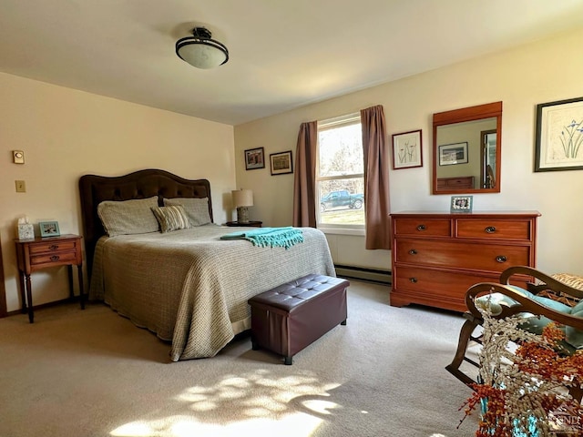 bedroom featuring light colored carpet and baseboard heating