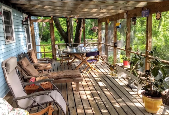 sunroom / solarium with wooden ceiling