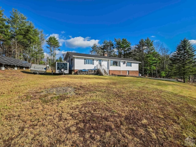 view of front of house featuring a front yard