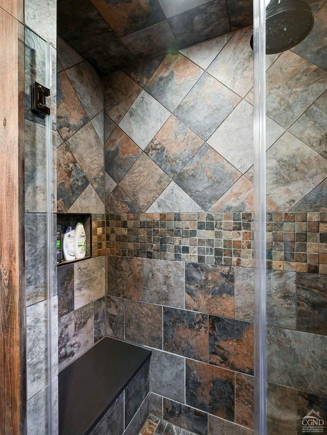 details featuring a tile shower