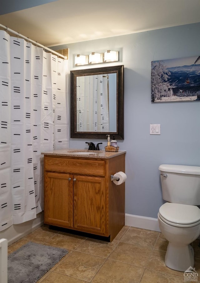 full bathroom featuring tile patterned floors, vanity, toilet, and shower / bath combo