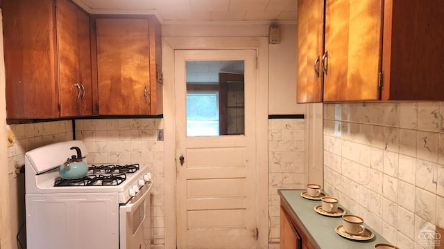 kitchen with white gas stove