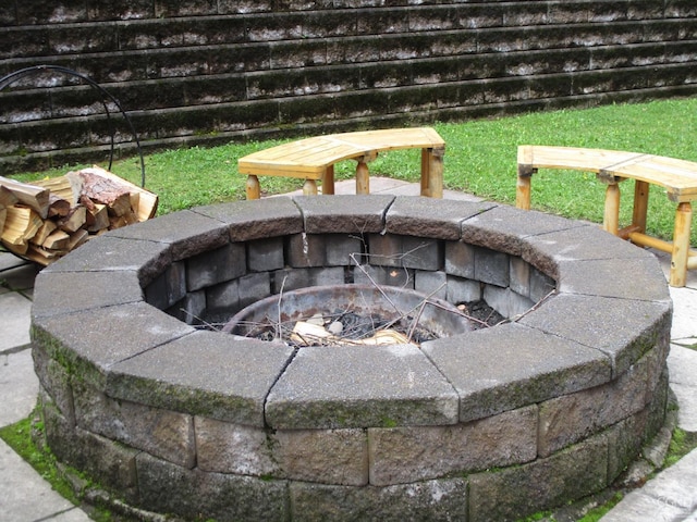 exterior details featuring a fire pit