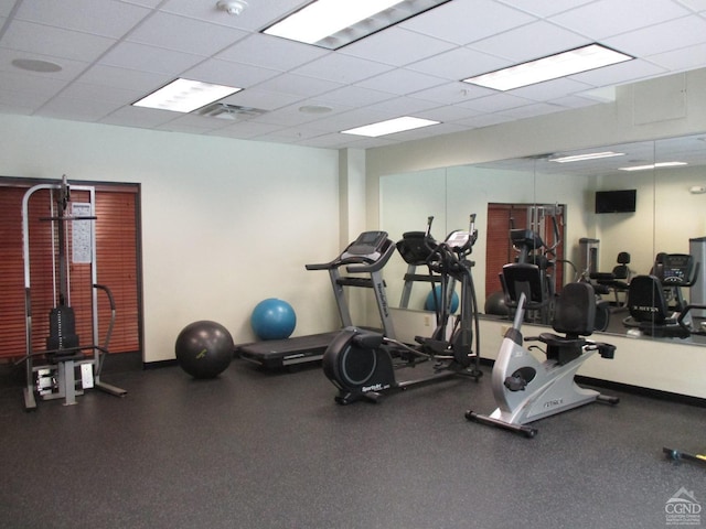 gym with a drop ceiling