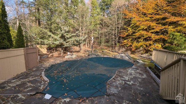 view of swimming pool featuring a patio