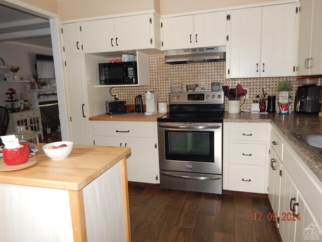 kitchen featuring dark hardwood / wood-style flooring, backsplash, ventilation hood, white cabinets, and stainless steel range with electric cooktop