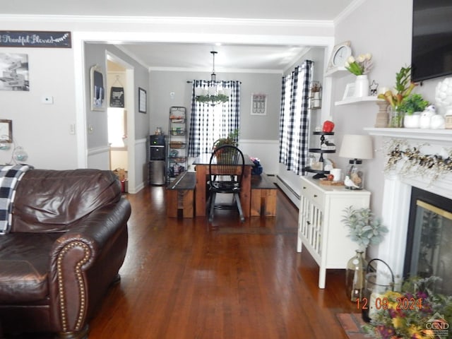 living room featuring baseboard heating, dark hardwood / wood-style floors, and ornamental molding