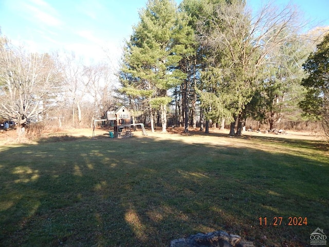 view of yard with a playground