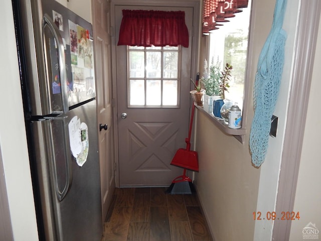 doorway with dark hardwood / wood-style flooring