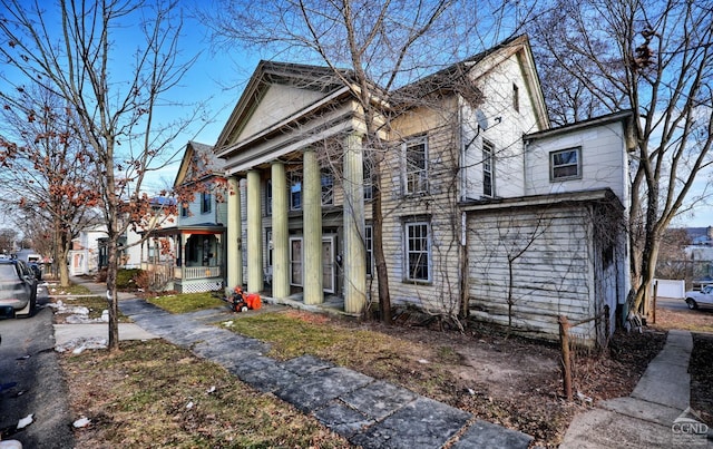 view of home's exterior featuring covered porch