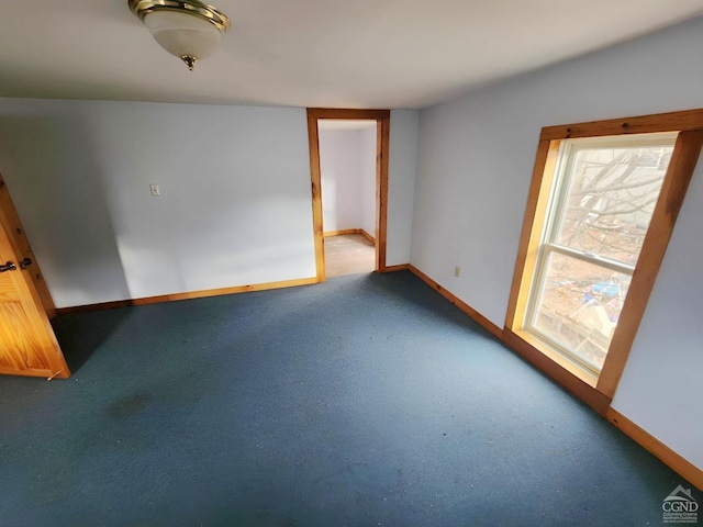 empty room with baseboards