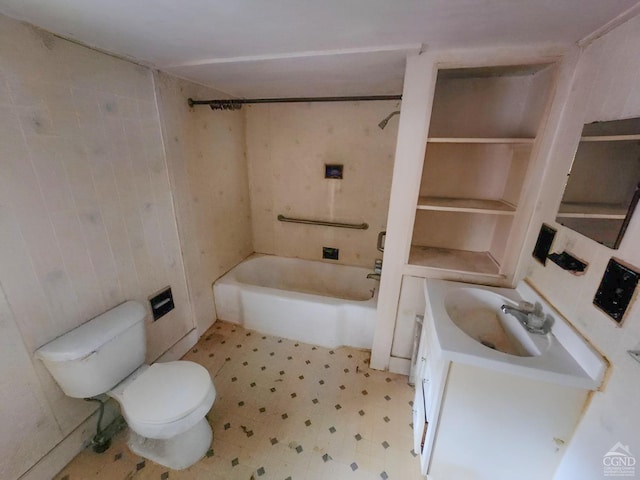 bathroom with toilet, tile patterned floors, vanity, and shower / bath combination