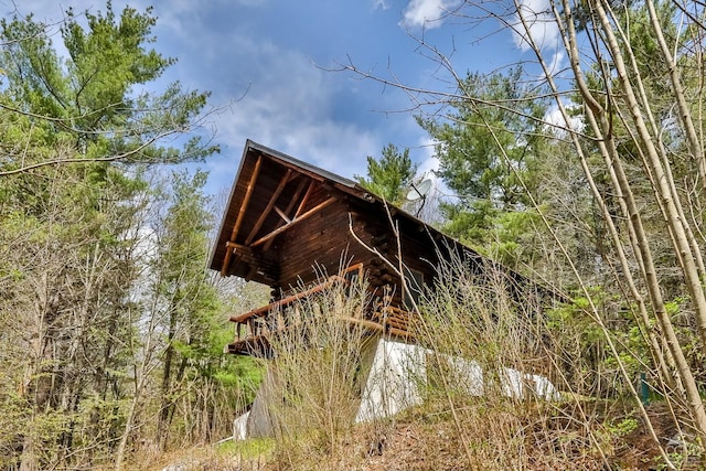 view of side of property with log siding