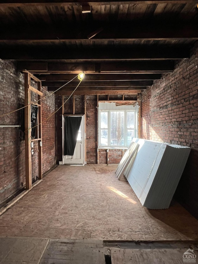 interior space with brick wall