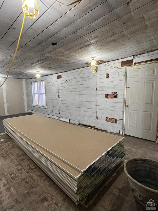 basement with wooden ceiling