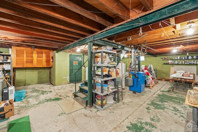 basement featuring gas water heater