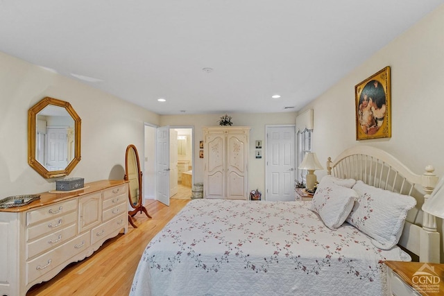 bedroom with light hardwood / wood-style flooring