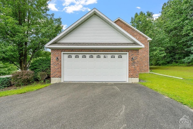 garage with a lawn