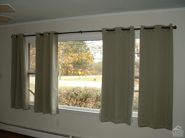 interior details with crown molding and ceiling fan