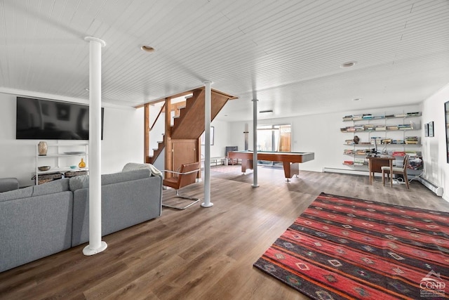 living room with stairs, billiards, and wood finished floors