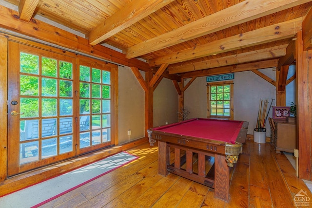 rec room with beam ceiling, light hardwood / wood-style flooring, a healthy amount of sunlight, and pool table