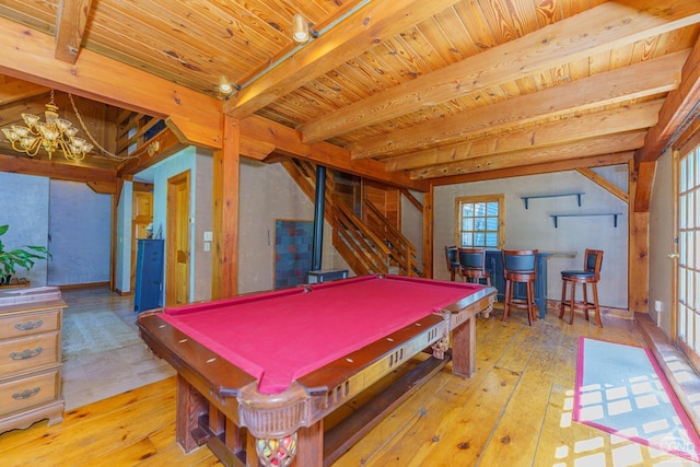 game room with beamed ceiling, light hardwood / wood-style floors, plenty of natural light, and pool table